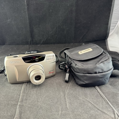 Canon sure shot zoom point - canon, 76